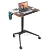 Pneumatic standing desk featuring a spacious tabletop, adjustable height, and a side cup holder for added convenience.