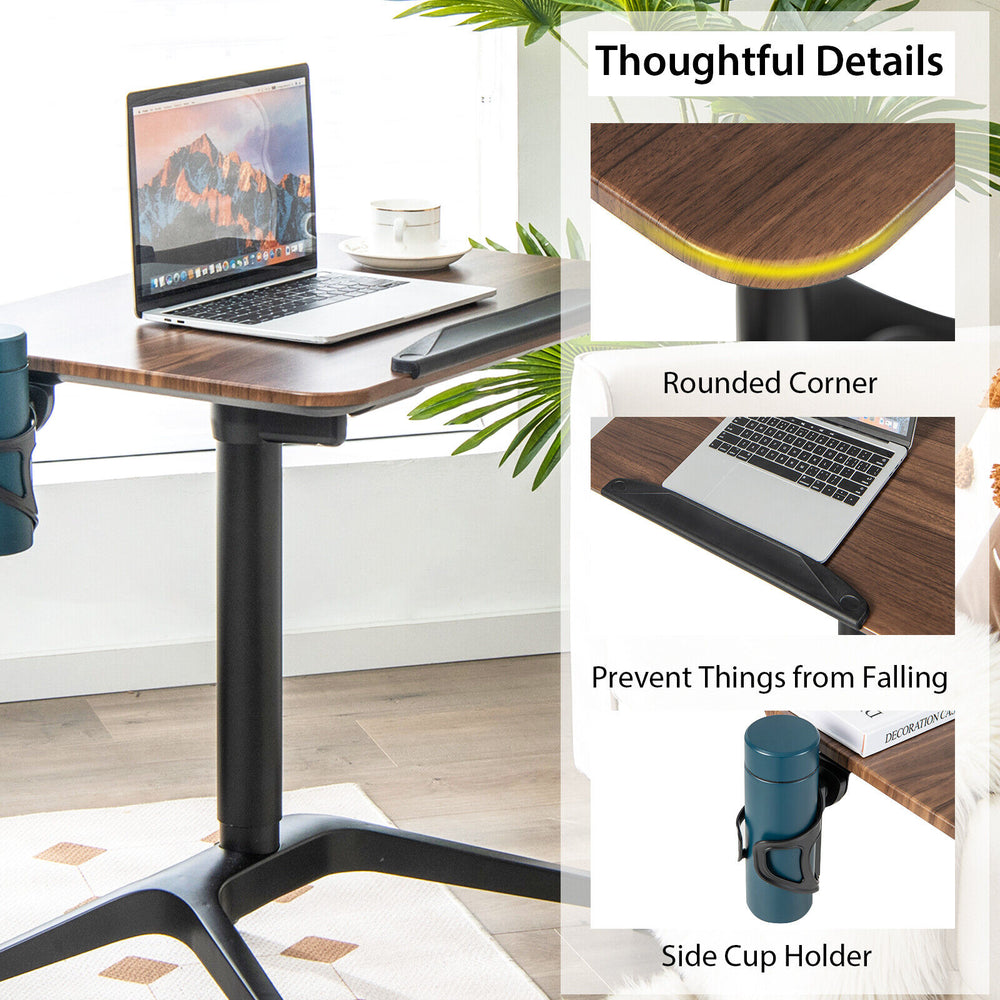 Pneumatic standing desk with adjustable height, anti-fall baffle, and side cup holder for versatile workspace use.