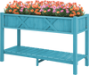 Elevated blue planter box with flowers, featuring drainage holes and a slatted shelf for gardening accessories.