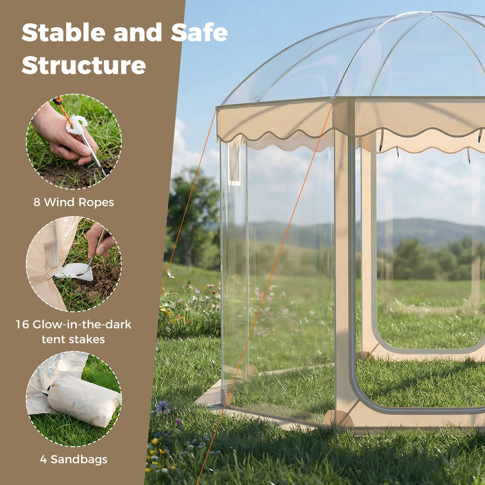 Pop-up bubble tent with 540° panoramic clear PVC, secured with wind ropes, stakes, and sandbags for stability.