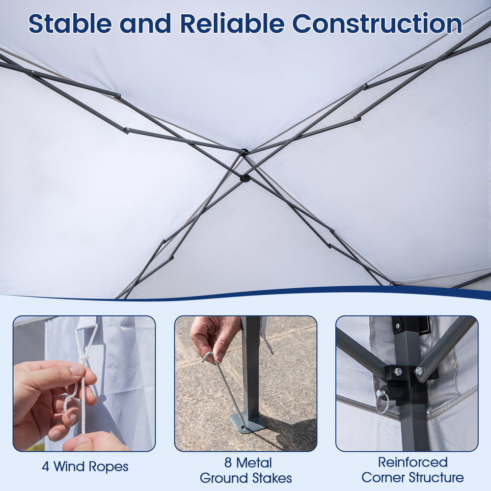 Close-up of the pop-up canopy tent's reinforced structure with 8 metal stakes and 4 wind ropes for secure setup.
