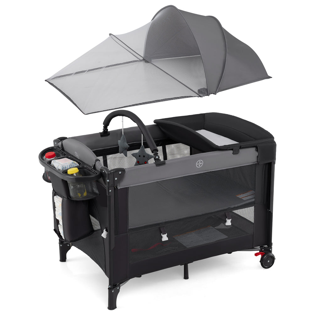 Foldable baby bassinet in gray featuring a detachable mesh cover and toy bar, ideal for safe playtime and sleep.