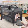 Foldable baby bassinet in gray with zippered door, adjustable heights, and mesh sides for easy baby access and.
