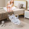 Portable gray baby bouncer with detachable toy bar, ergonomic design, and safety harness for infant comfort and play.