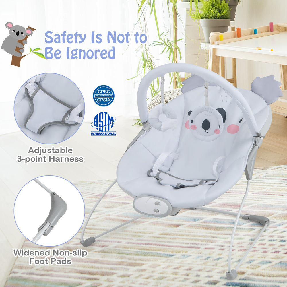Portable baby bouncer seat in gray with adjustable 3-point harness and detachable toy bar for safe, soothing play.