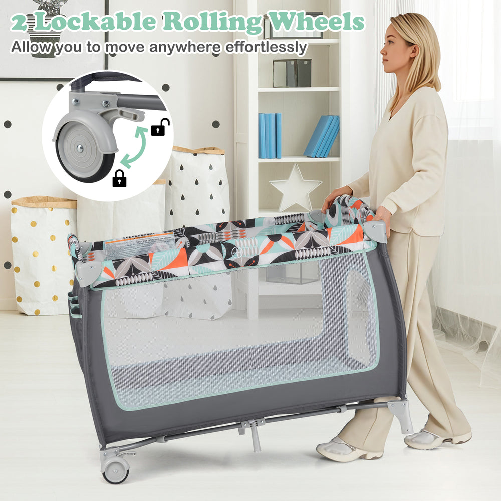Portable baby playard with zippered door and toy bar, featuring durable oxford cloth and lockable rolling wheels for.