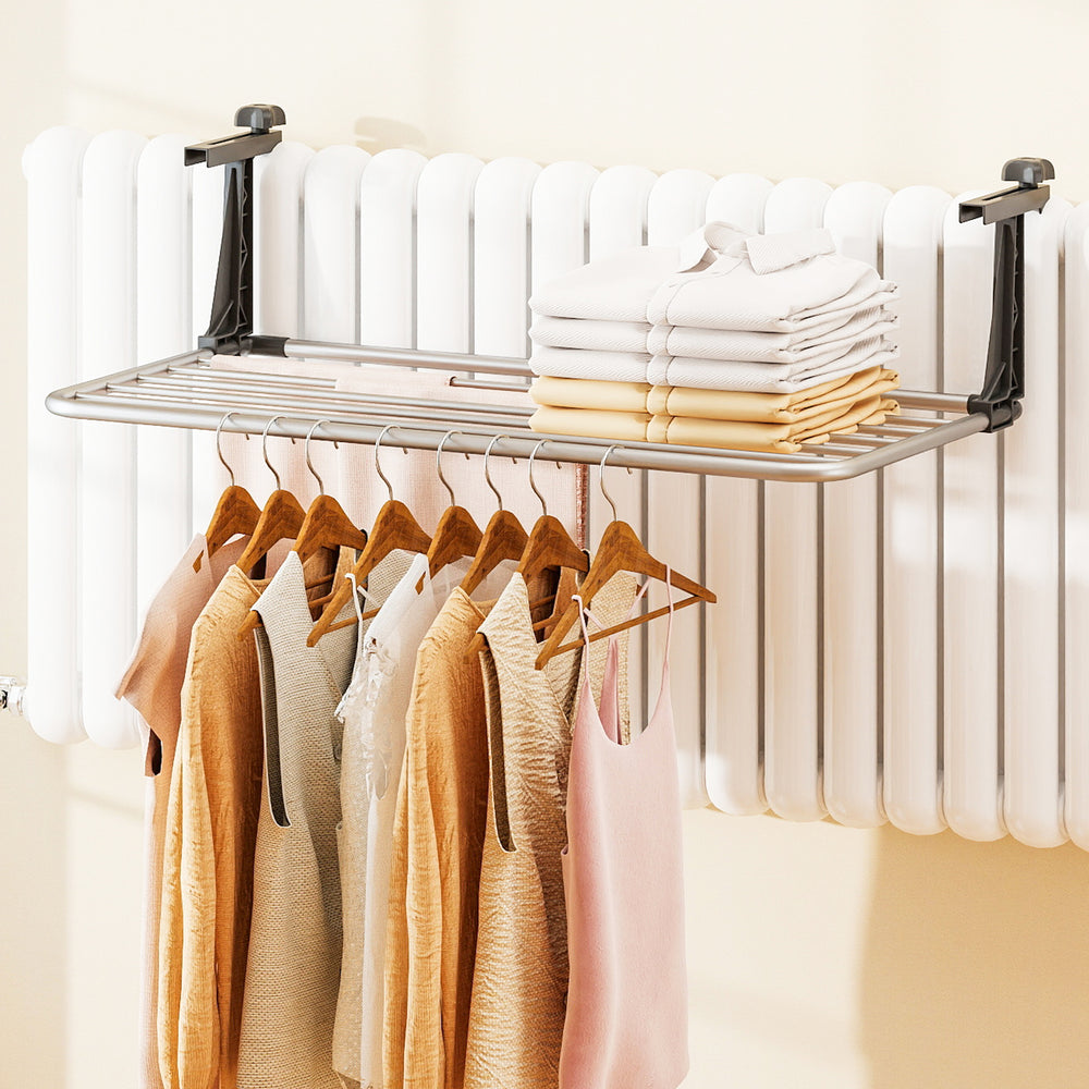 Portable aluminum clothes drying rack with adjustable brackets, featuring 7 bars for efficient drying on radiators.