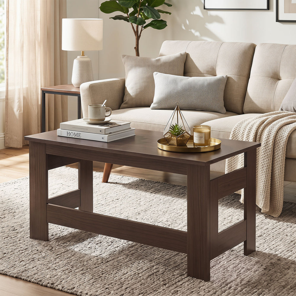 Brown portable low floor table with foldable legs, ideal for living room use, featuring a spacious desktop and.