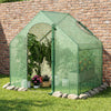 Portable outdoor warm house with PE cover, showcasing plants inside, designed for stability and easy air circulation.