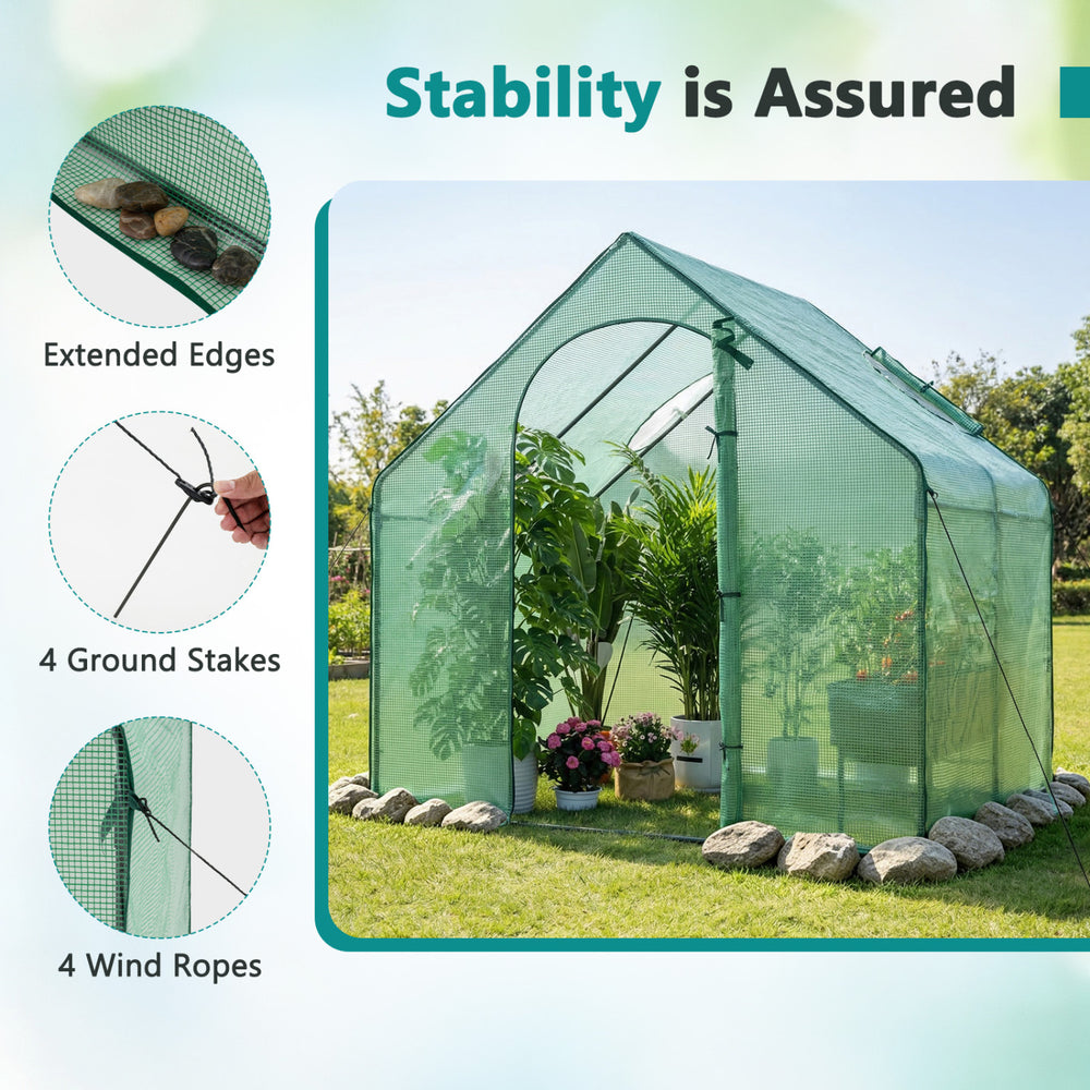 Portable outdoor warm house with PE cover, zippered door, and extended edges for stability and plant protection.