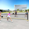 Portable 22 ft pickleball net with 6 lockable wheels, set up for outdoor play in a vibrant sports environment.