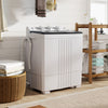 Portable washing machine with built-in drain pump, 12 lbs capacity, designed for home and RV use, featuring a compact.