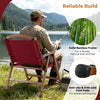 Portable folding camping chair with solid bamboo frame and waterproof fabric, perfect for fishing and outdoor leisure.