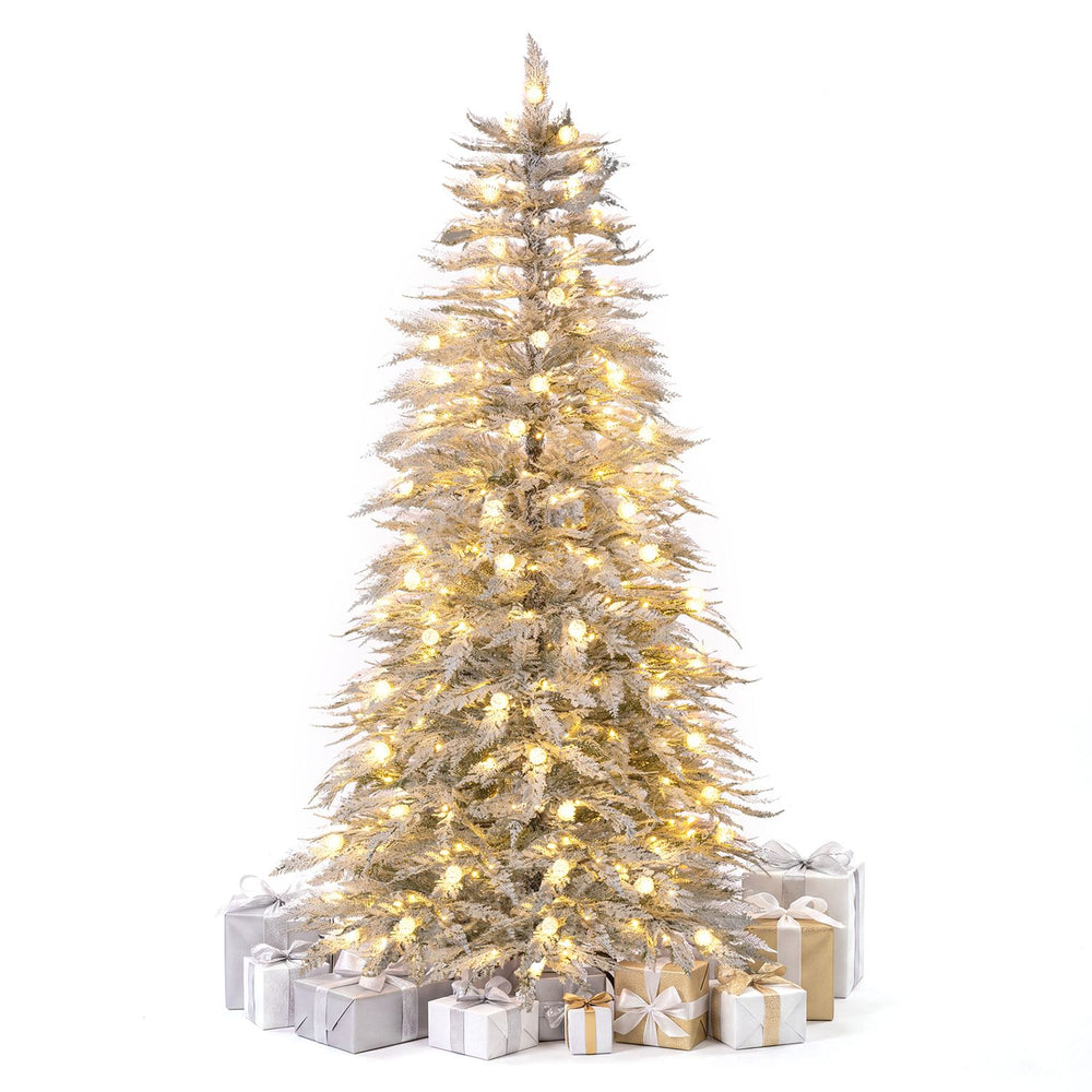 Pre-lit artificial Christmas tree with warm white LED lights, featuring a snowy texture and elegant cypress-inspired design.