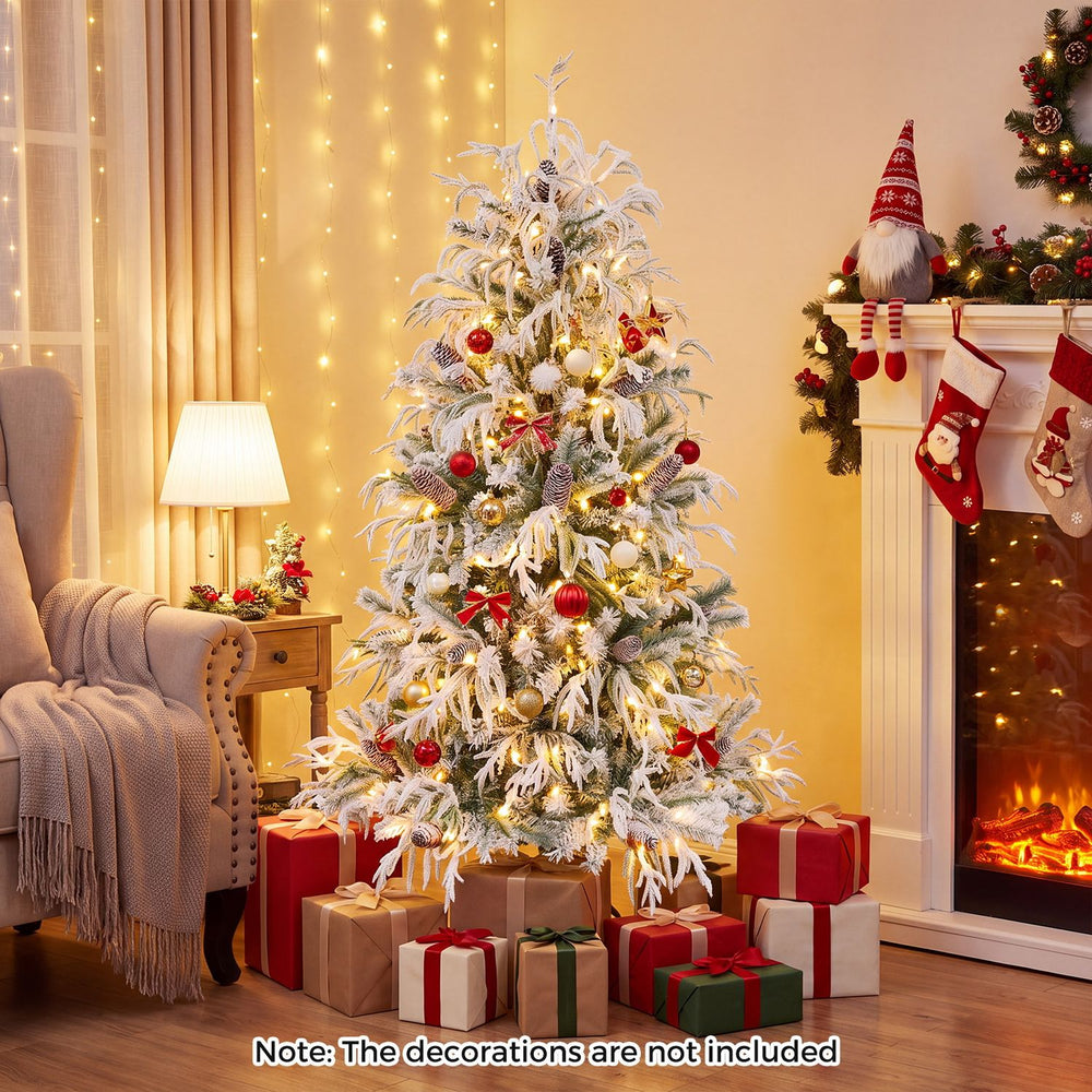 Pre-lit artificial Christmas tree with warm white LED lights, snow flocking, and a stable metal base for holiday decor.