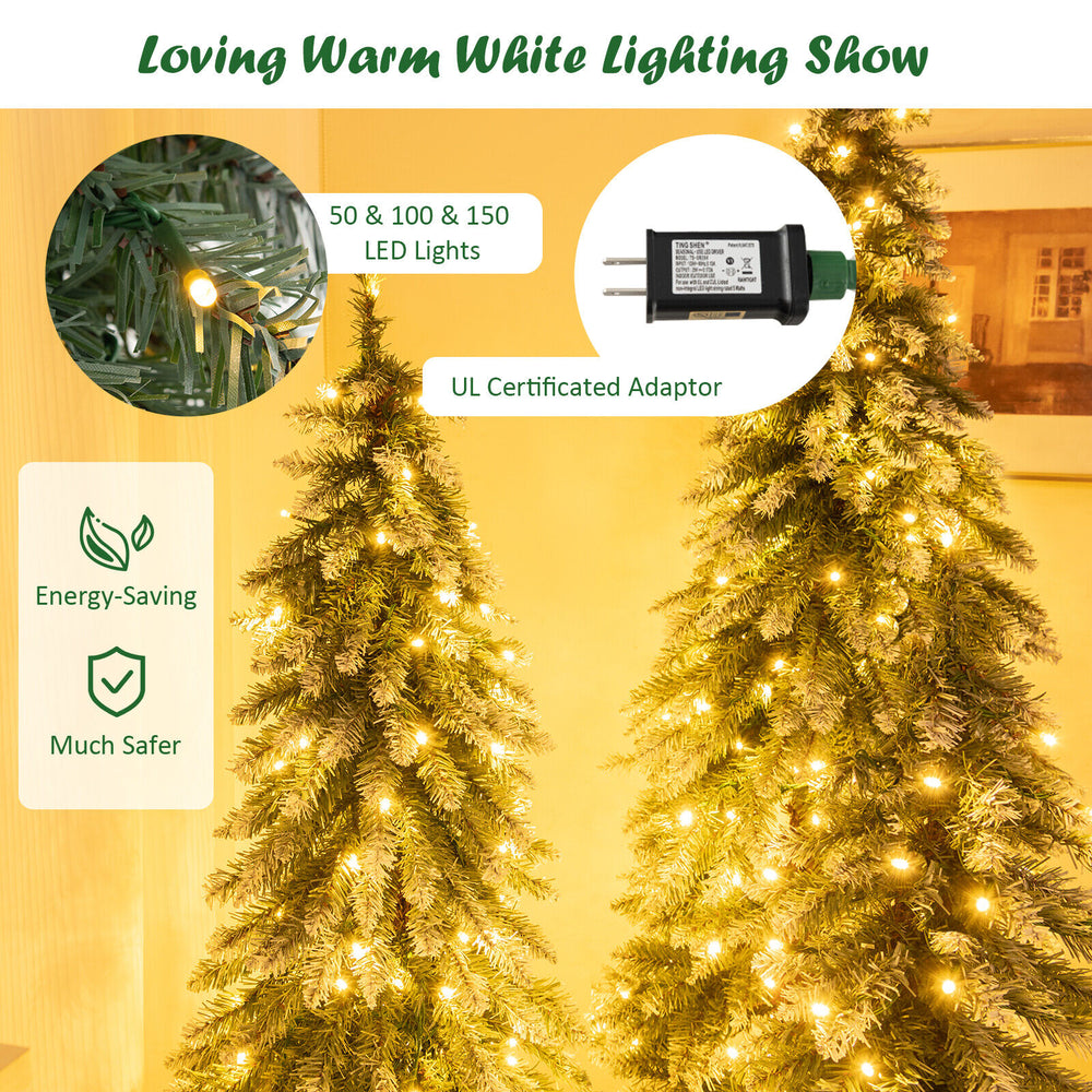 Pre-lit snowy slim Christmas tree set of 3 with warm white LED lights, perfect for creating a magical holiday.
