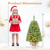 Pre-lit mini Christmas tree with 50 warm white LED lights, pine cones, and a linen-wrapped base, shown beside a child for scale.