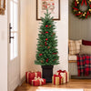 Pre-lit potted pencil Christmas tree with red berries and pine cones, perfect for festive holiday decor in any space.
