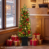 Pre-lit potted pencil Christmas tree with 200 LED lights, featuring red berries and pine cones, perfect for festive decor.