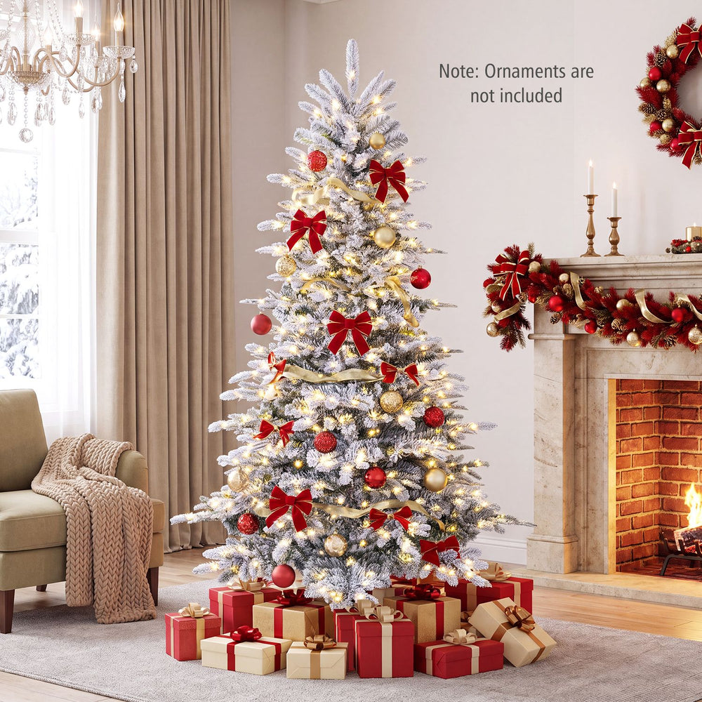 Snow flocked 7/6 FT pre-lit artificial Christmas tree with 500 LED lights and a stable metal base for festive holiday decor.
