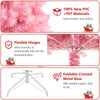 Pre-lit pink tinsel Christmas tree with 688 lush branch tips, flexible hinges, and a sturdy metal base for holiday.