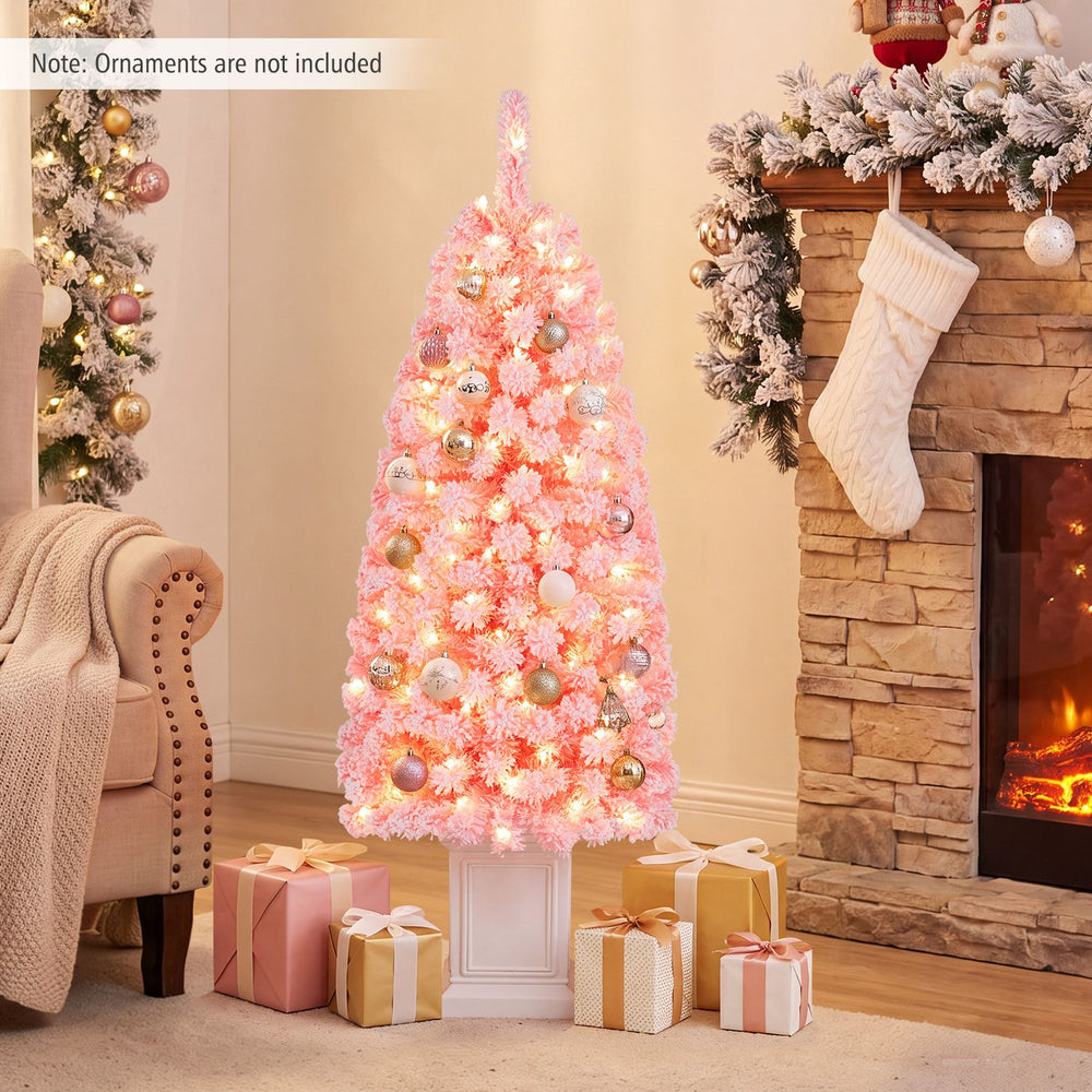 Potted 4FT pre-lit artificial Christmas tree with 130 warm white LED lights and snow-flocked pink leaves for festive charm.