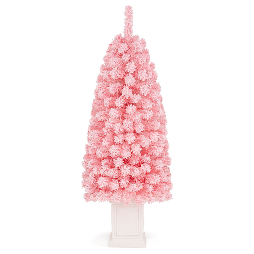 Pink pre-lit potted artificial Christmas tree with 100 warm white LED lights, featuring a snow-flocked design for festive decor.