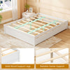 Queen size bed frame in white with slatted platform, solid wood support legs, and two rolling storage drawers.