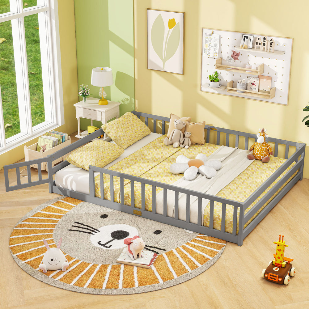 Gray Montessori floor bed with full-length safety guardrails, perfect for kids' sleeping and playtime activities.