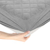 Gray velvet mattress protector with non-slip bottom and 360° fabric pocket for Queen size mattresses up to 16" height.