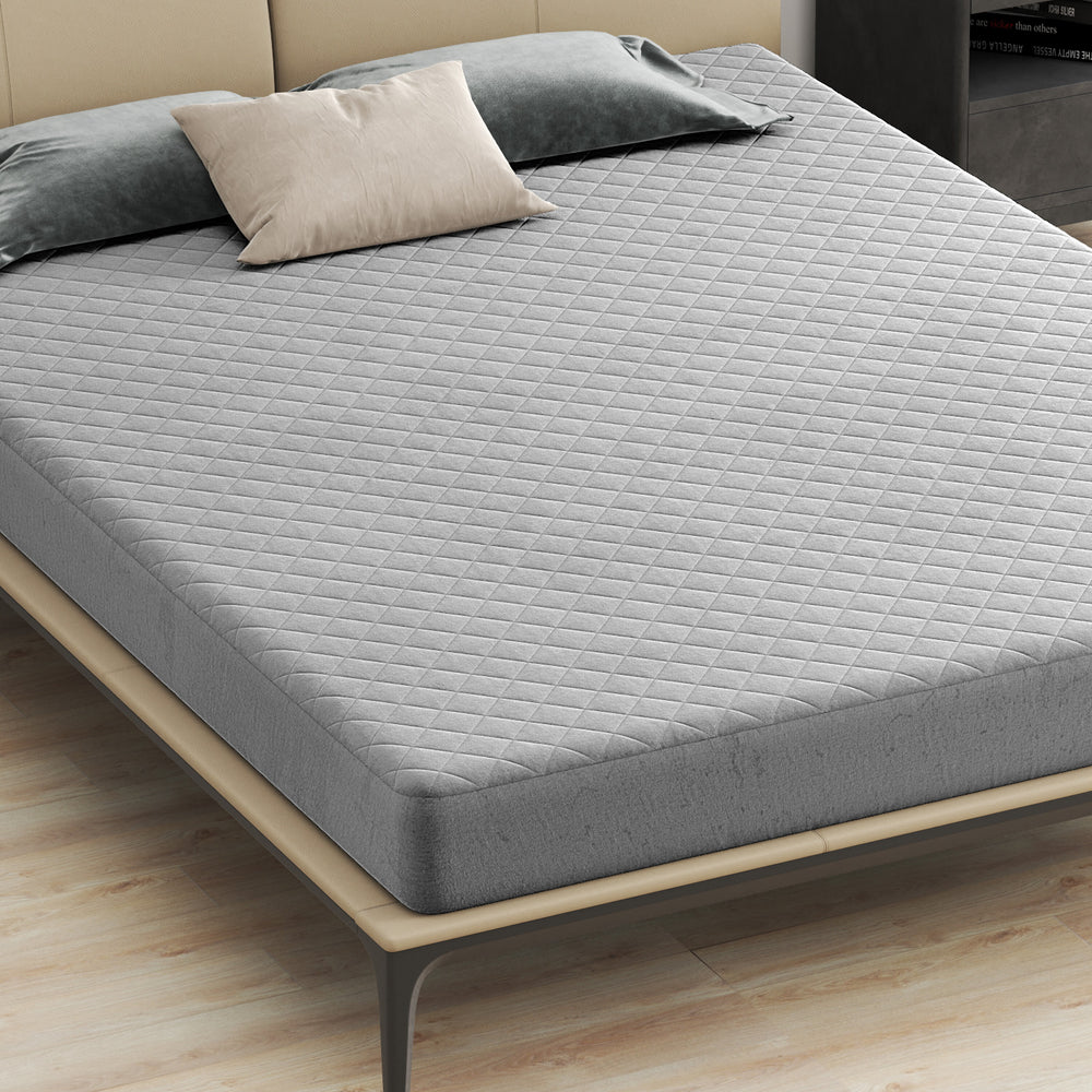 Queen size luxury super soft velvet mattress protector with square jacquard design and non-slip bottom for stability.