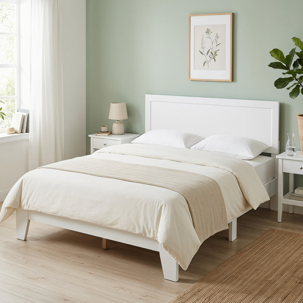 Queen size modern bed frame in white with mid-century headboard, featuring wooden slats and ample under-bed storage.