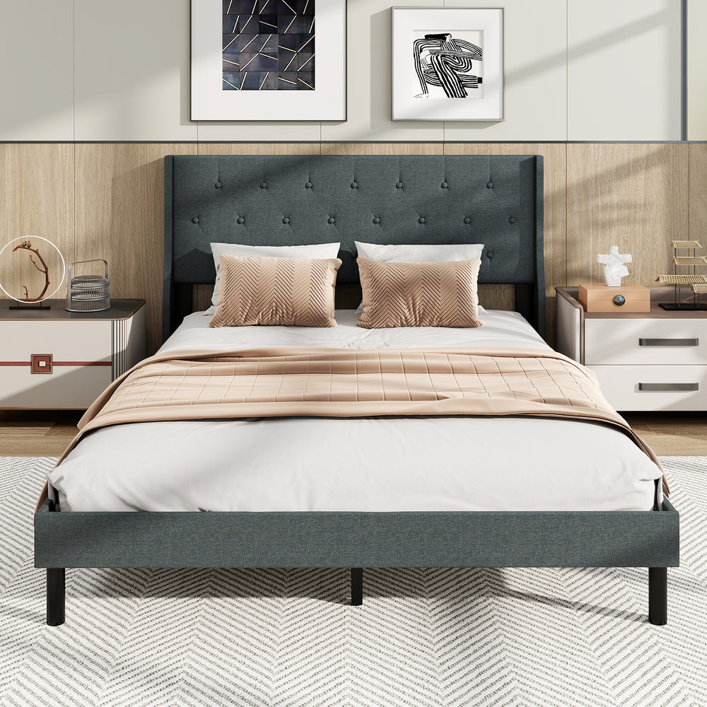Queen size upholstered bed frame with button tufted wingback headboard in gray, featuring wooden slats for mattress.