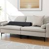 Trapezoidal bed wedge pillow in a light color, designed to fill gaps and support spinal alignment on sofas or beds.