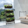 4-tier vertical raised garden bed with a robust metal frame, showcasing a variety of plants in a space-saving design.