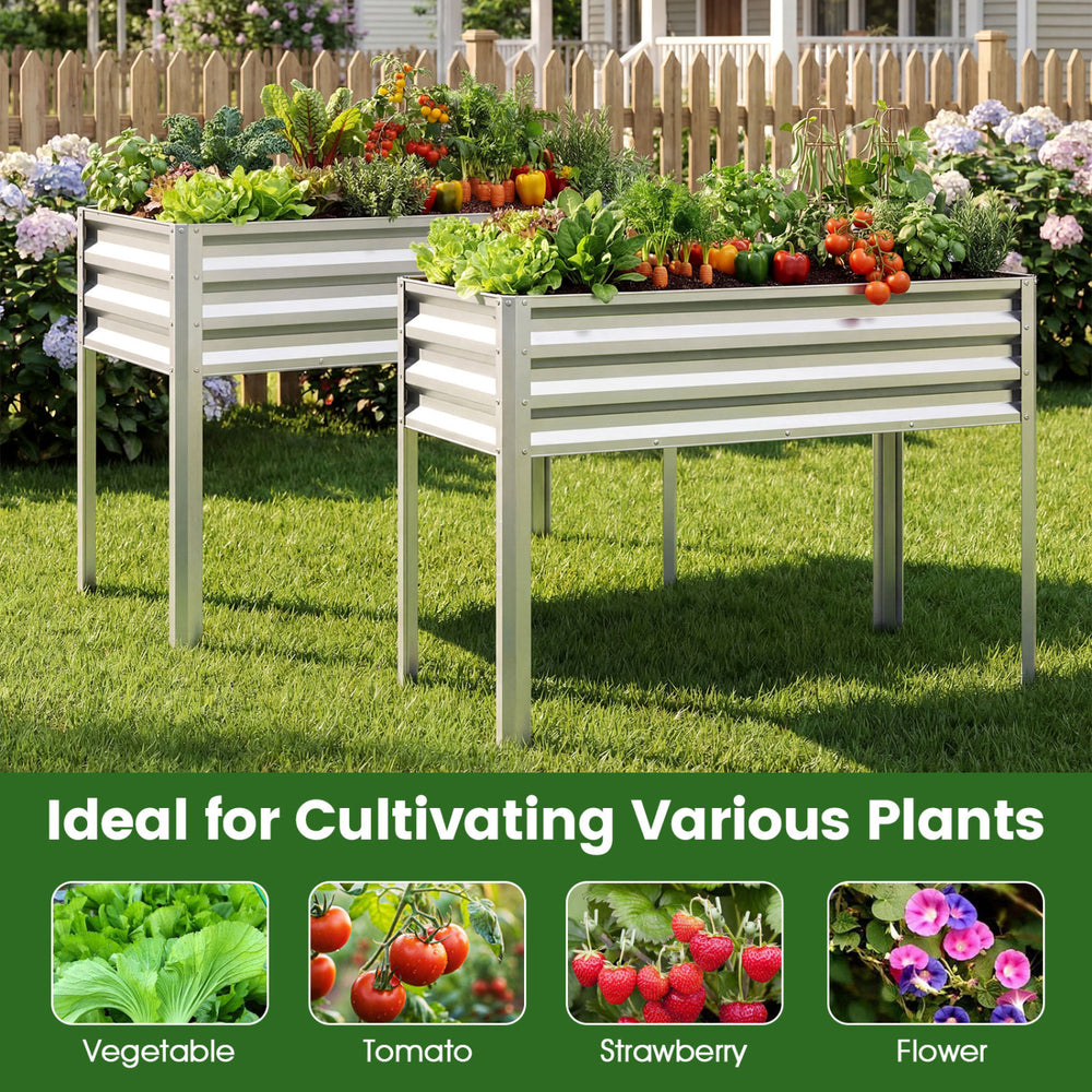 Large elevated planter boxes in silver, ideal for cultivating vegetables and flowers, featuring a 32" height for.