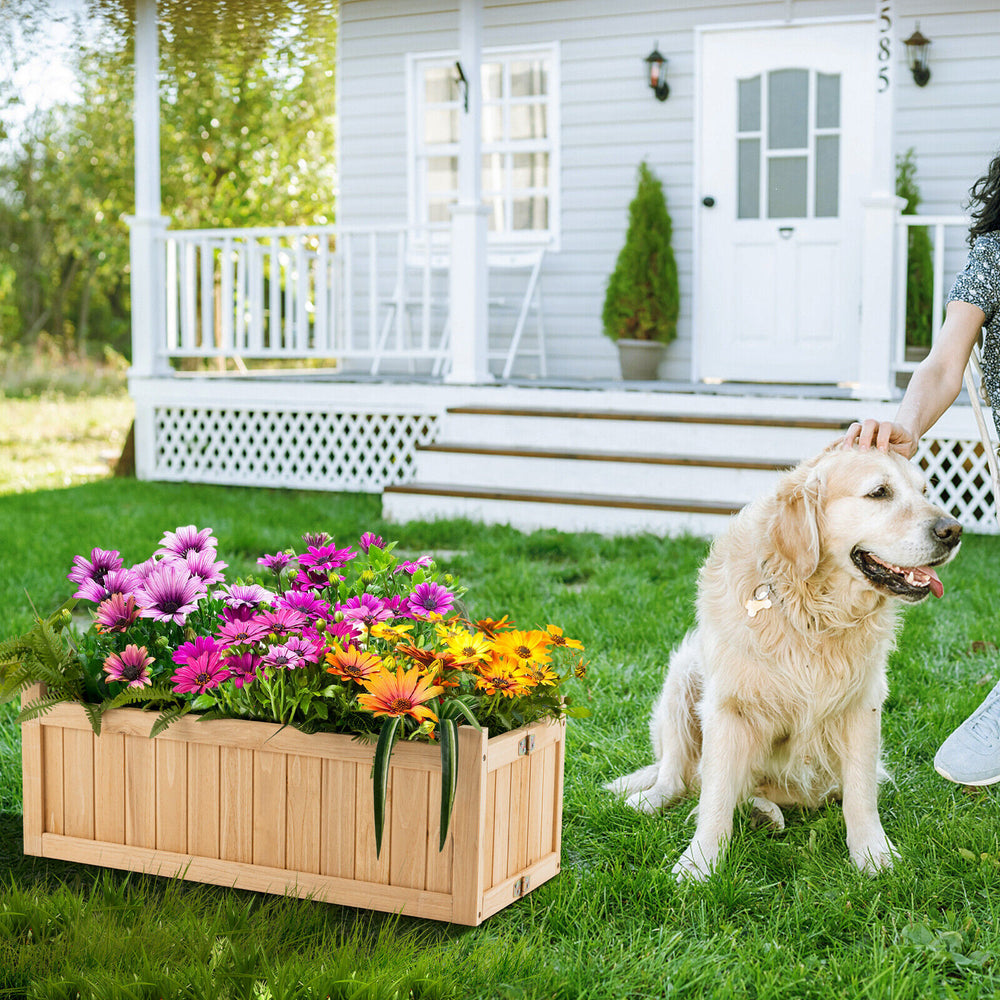 Folding wooden raised garden bed with vibrant flowers, ideal for patio or garden, featuring a removable bottom for easy.