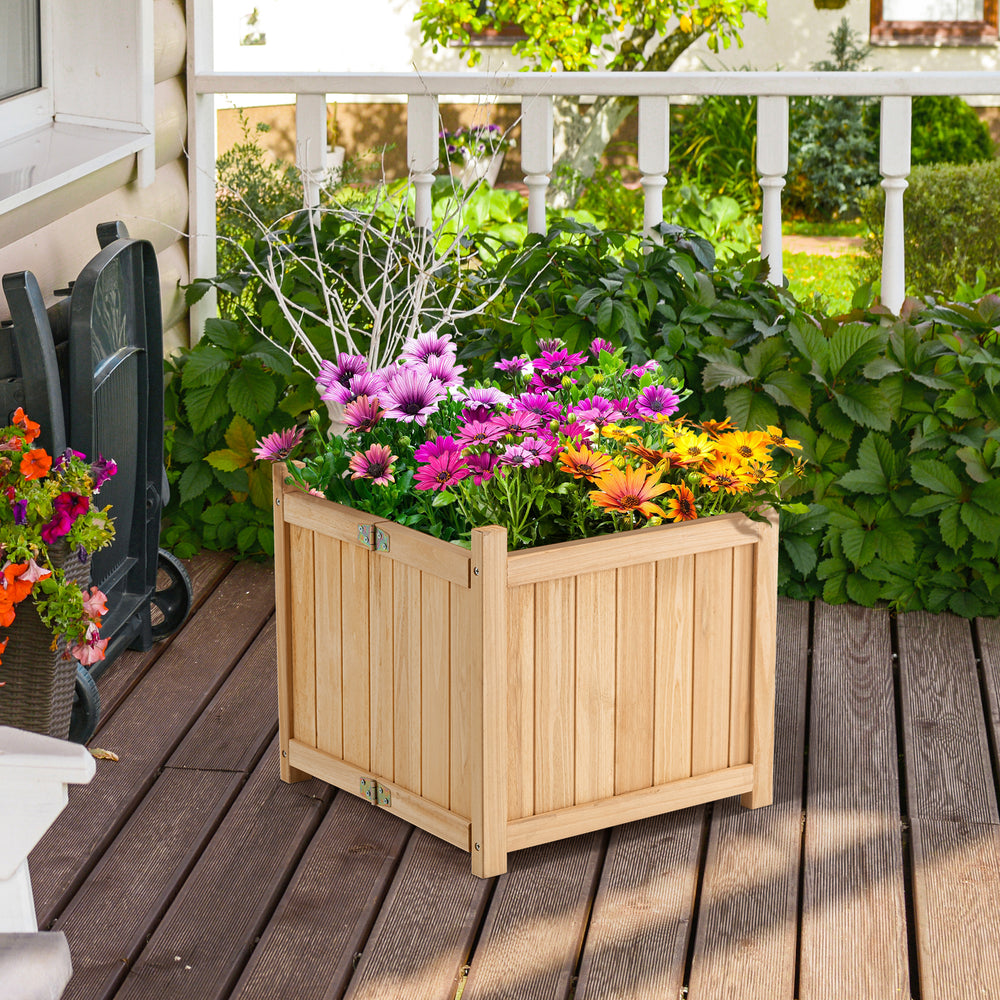 Folding square fir wood raised garden bed with colorful flowers, perfect for patio or garden planting.