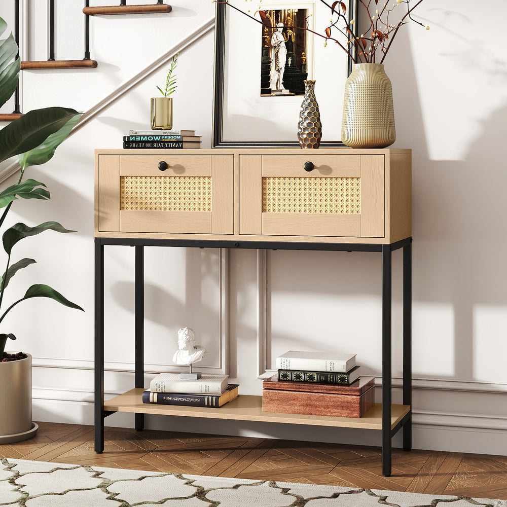 Boho-inspired rattan console table with two drawers and open shelf, perfect for entryway or living room storage.