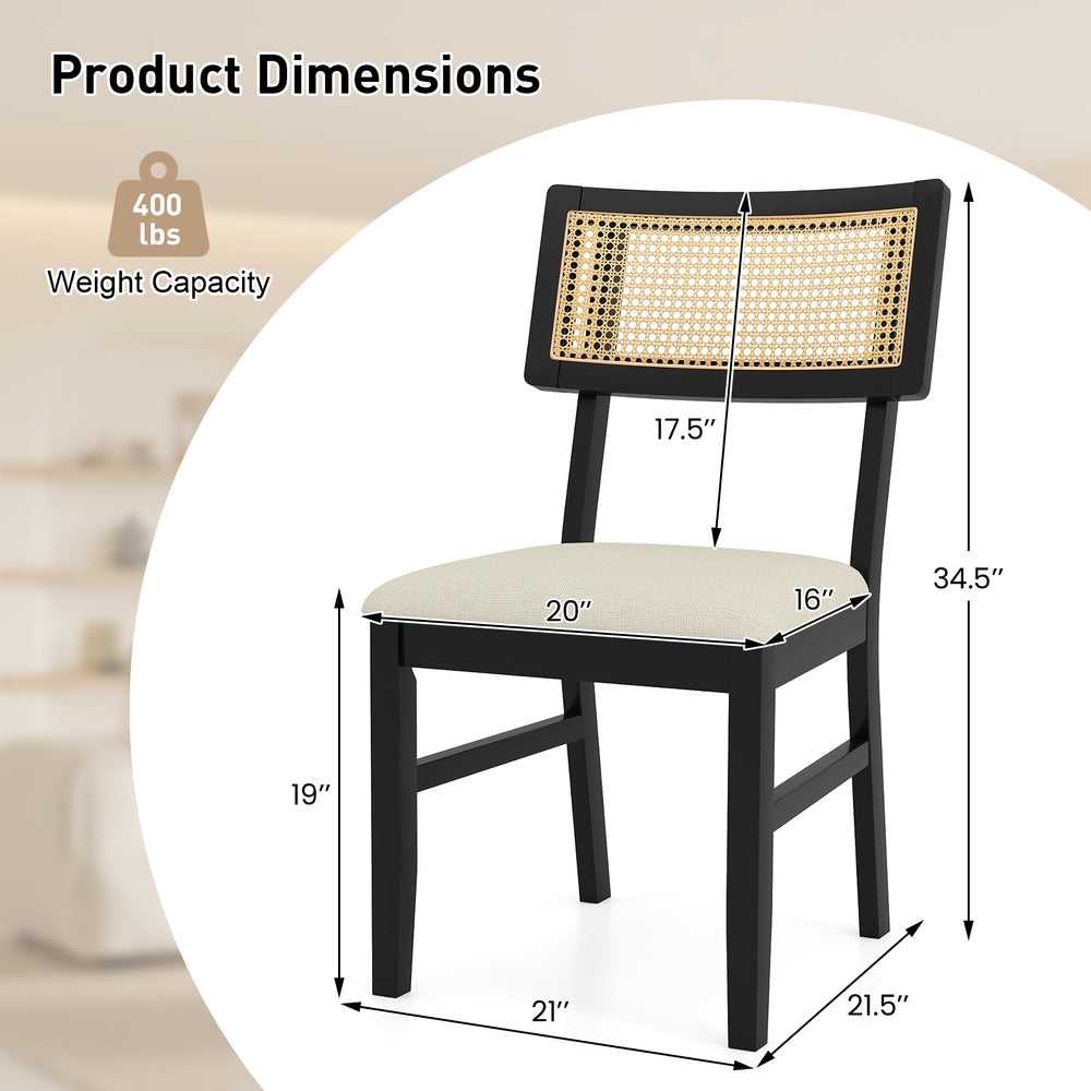 Black rattan dining chair with padded seat, rubber wood legs, and dimensions for optimal comfort and support.