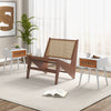 Mid-century modern accent table with white finish, rattan drawer, and solid wood legs for stylish storage and decor.
