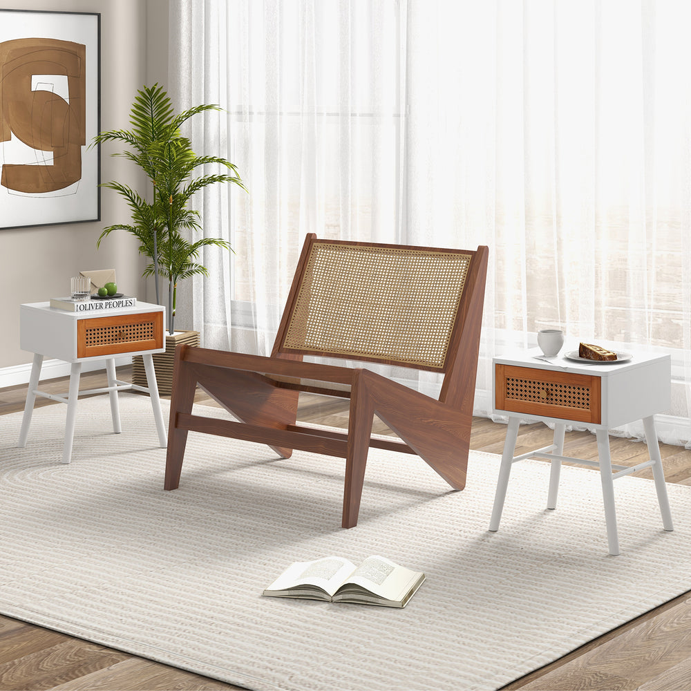 Mid-century modern accent table with white finish, rattan drawer, and solid wood legs for stylish storage and decor.
