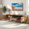 Mid-century modern rattan TV stand with two cabinets, open shelf, and drawer, perfect for TVs up to 80".