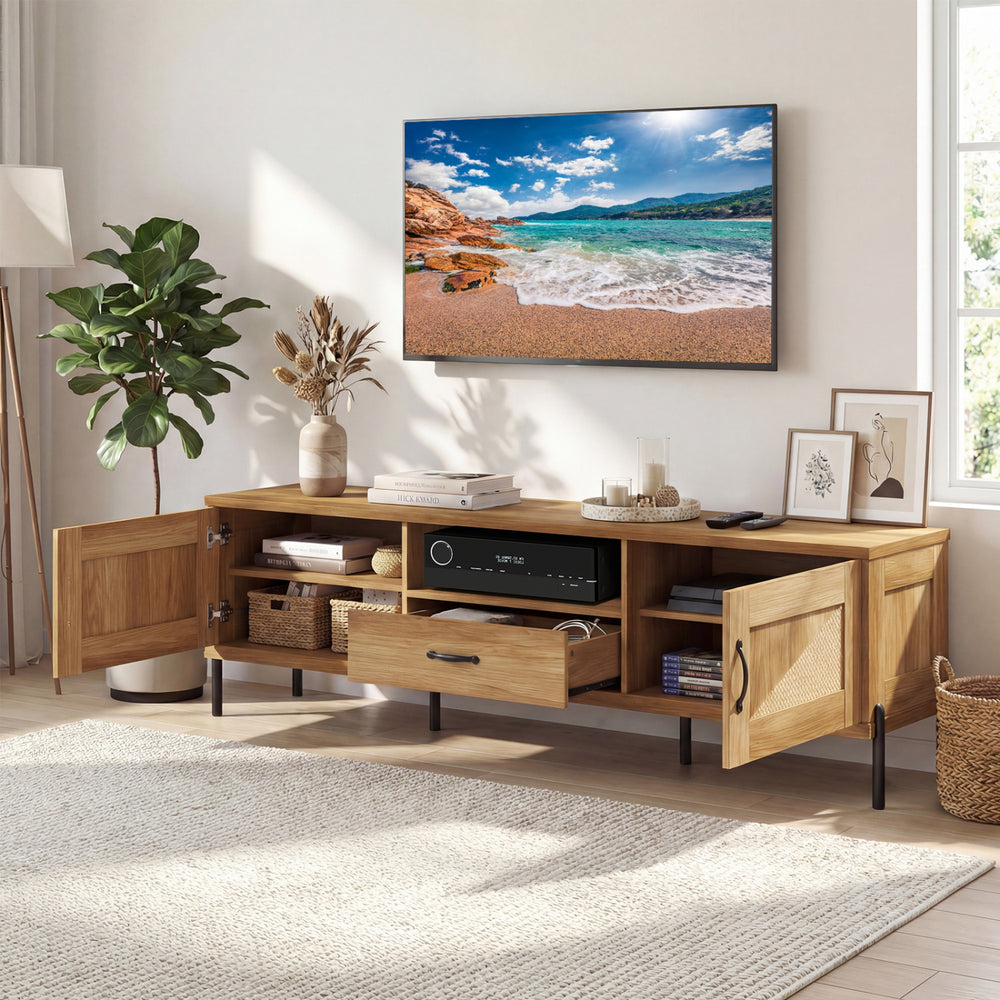 Mid-century modern rattan TV stand with two cabinets, open shelf, and drawer, perfect for TVs up to 80".