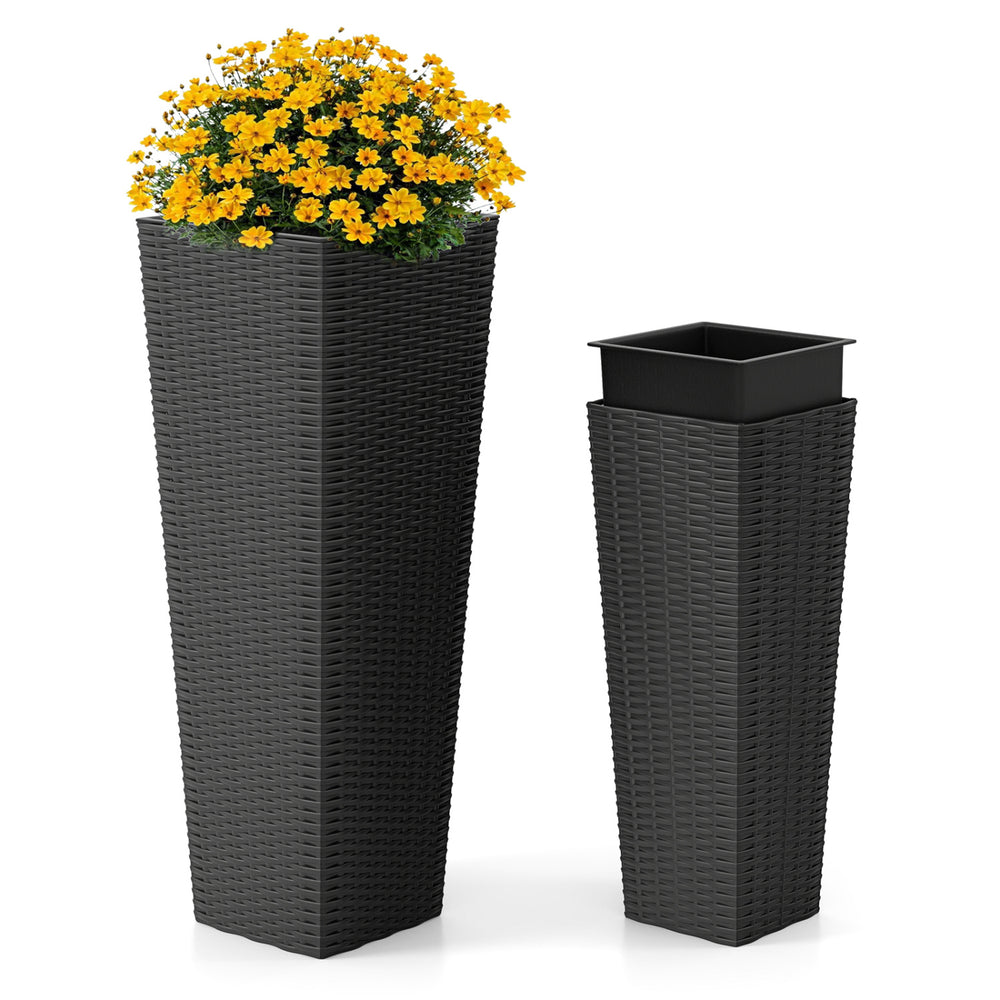 Tall and short black rattan planters set with removable trays, ideal for outdoor patios and gardens.