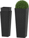 Tall and short black rattan planters with removable trays, perfect for outdoor patios and gardens.