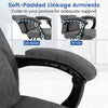 Soft-padded linkage armrests of the gray reclining office chair provide ergonomic support for various postures.