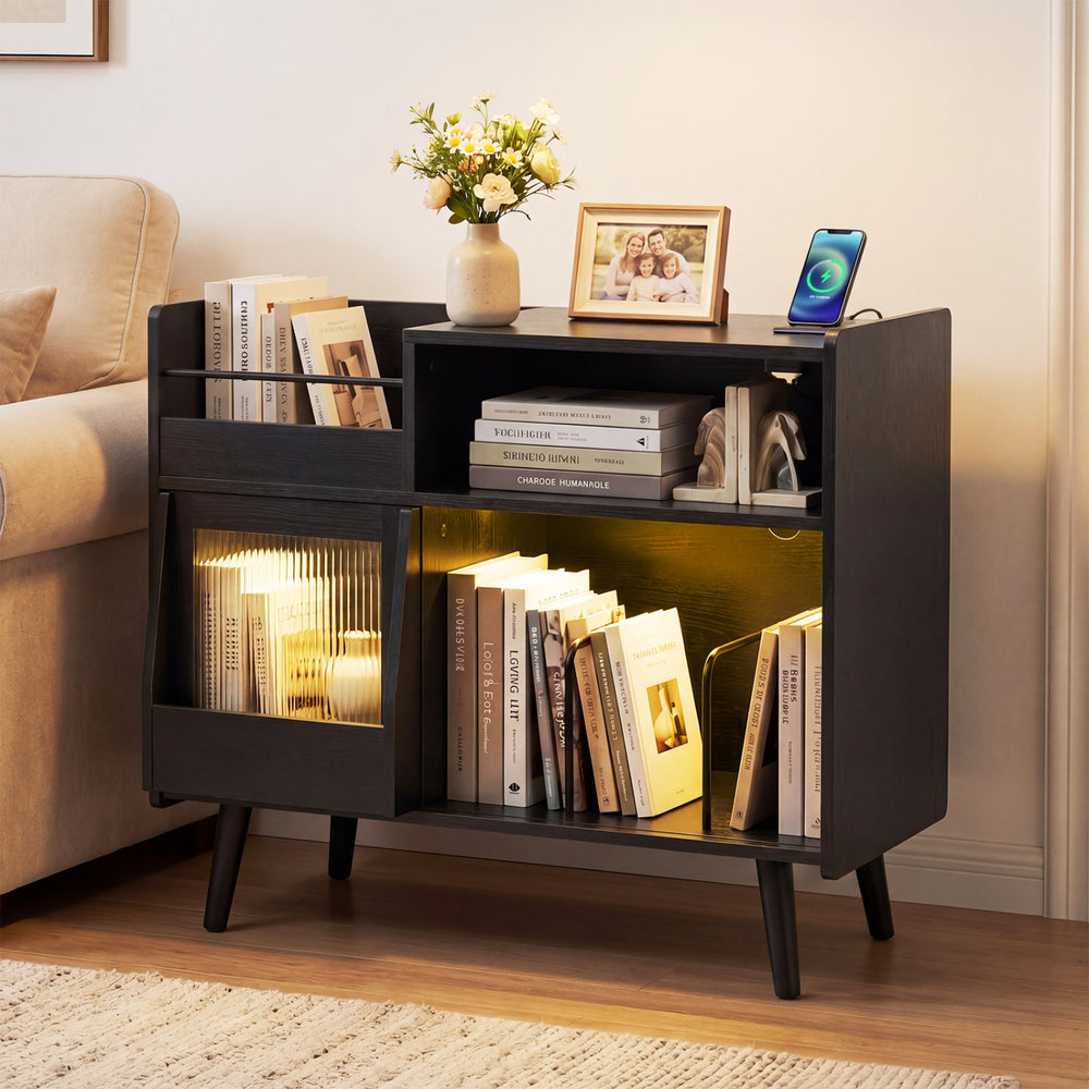 Record player stand in black with LED light, power outlets, and books displayed on shelves for stylish organization.