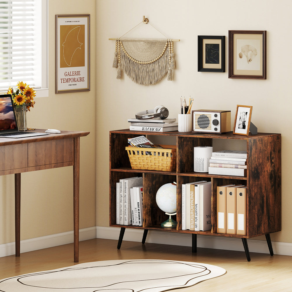 Rustic brown record player stand with open shelves and charging station, featuring ample storage for vinyl records.