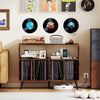 Record player stand in rustic brown with open shelves, storing vinyl records and featuring a charging station.
